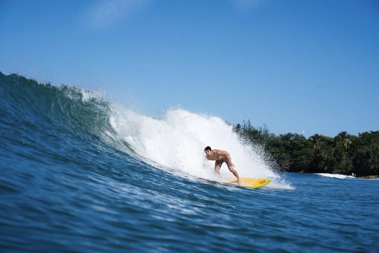 Joe Gallo surfing