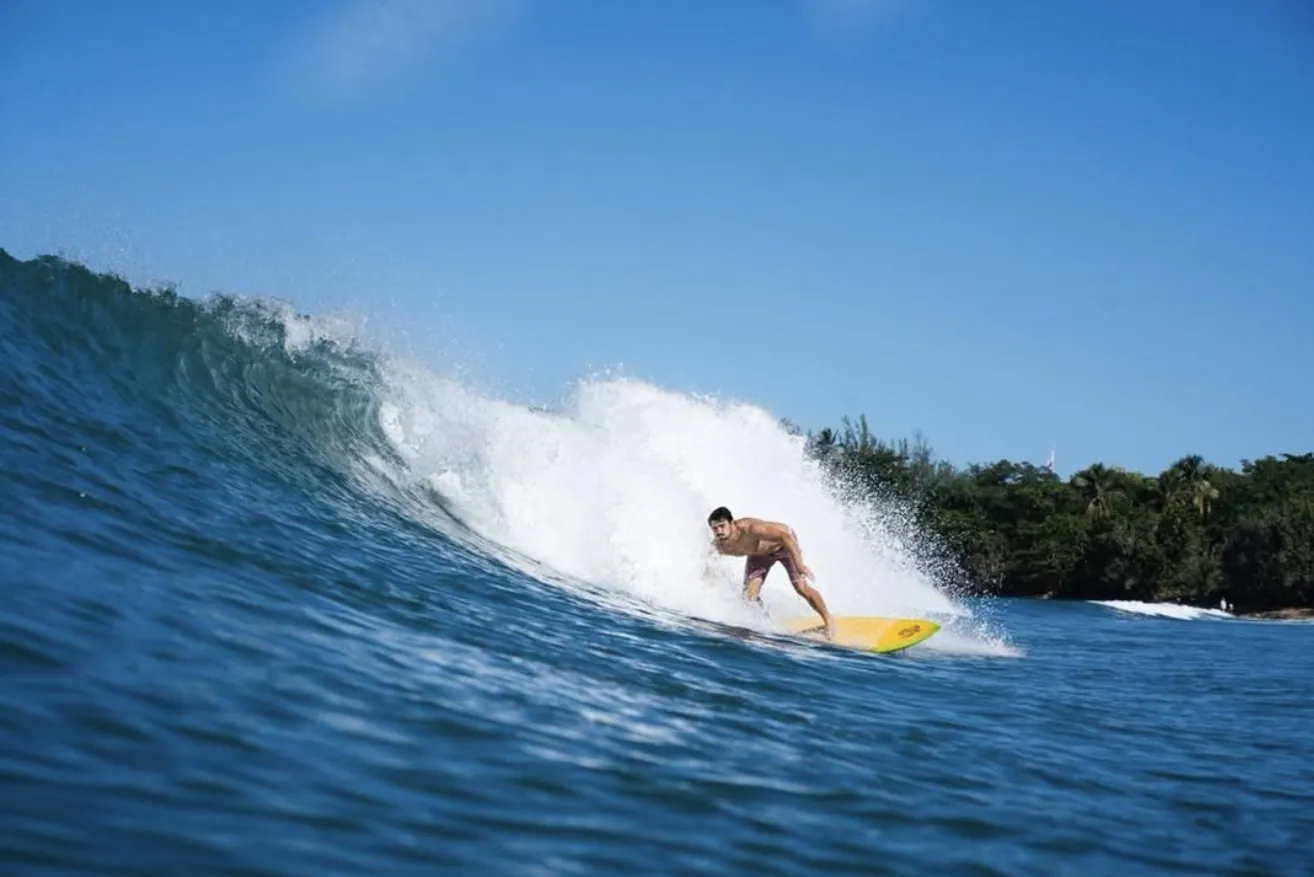 Joe Gallo surfing