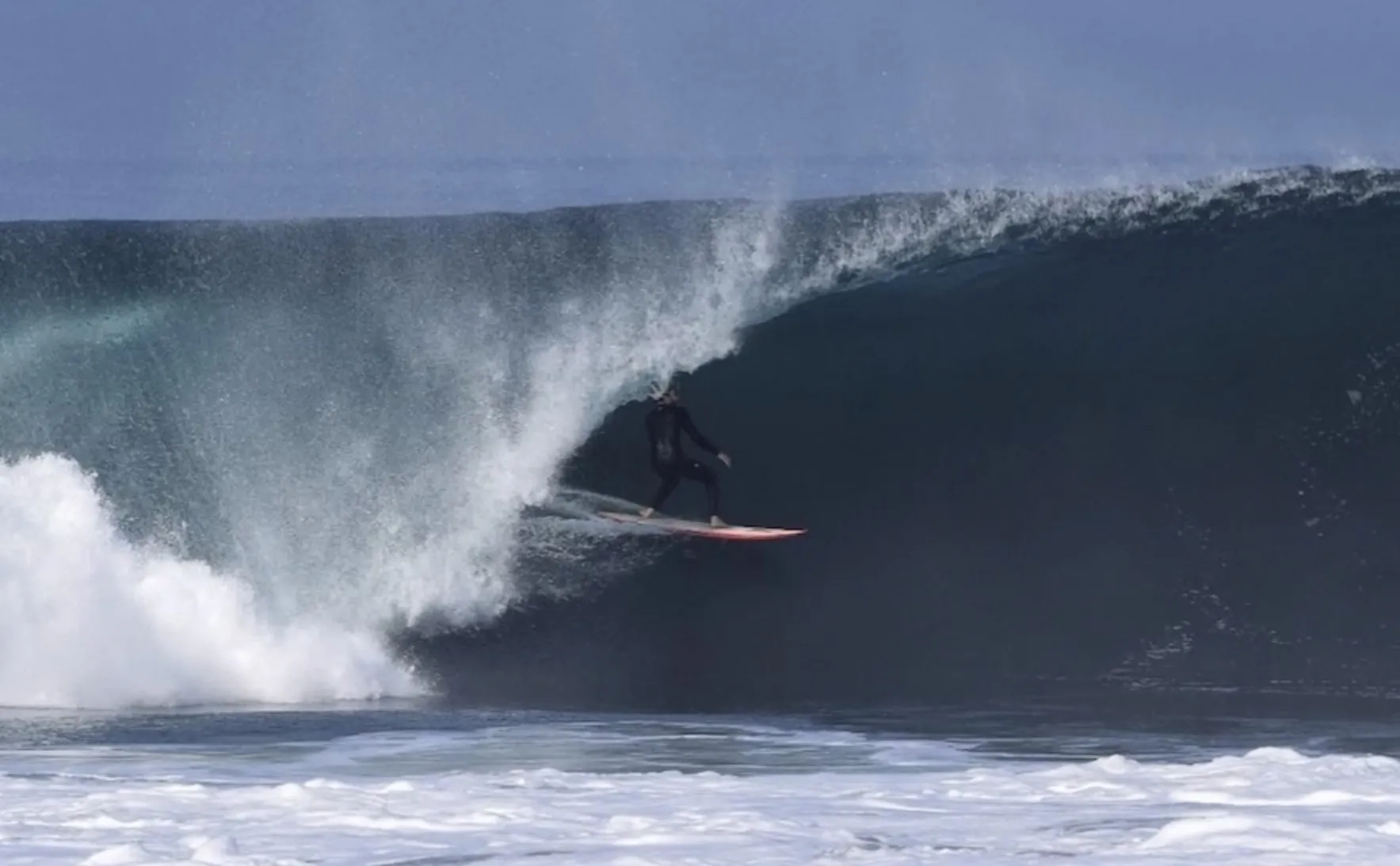 Joey Crum surfing