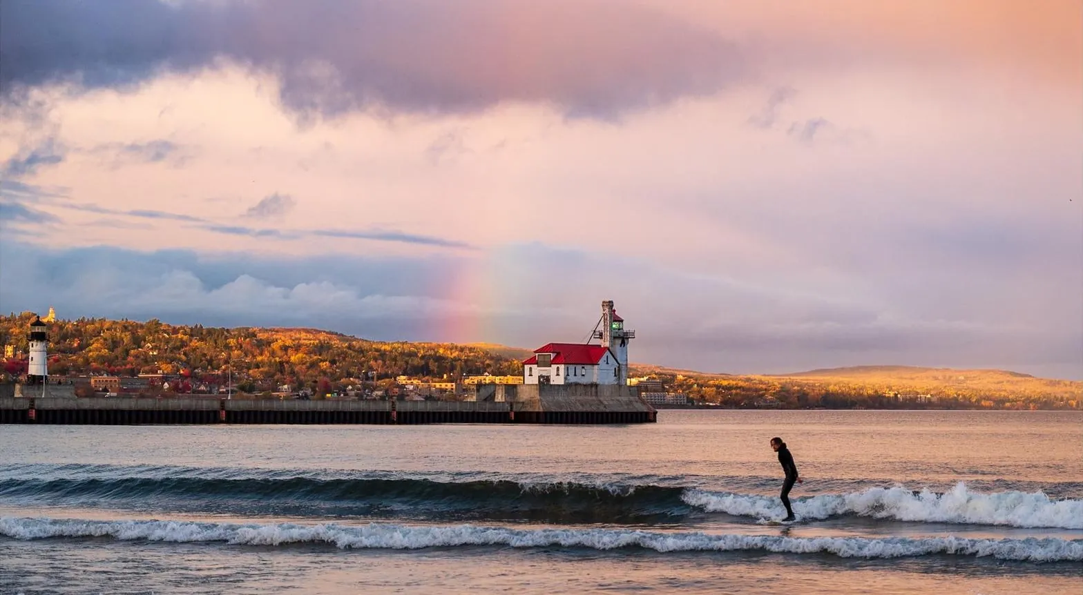 Oliver Newton surfing